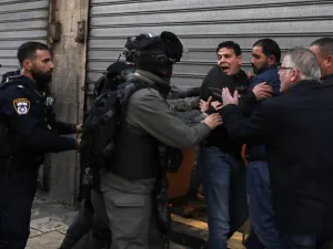 Israeli security forces scuffle with demonstrators in Jerusalem's Old City on Jan. 6, 2018, as protests continue in the region amid anger over U.S. President Donald Trump's recognition of Jerusalem as its capital (AFP)