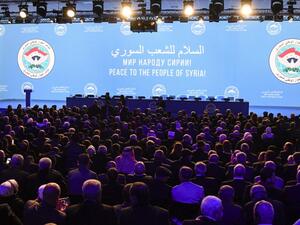 Attendees wait for the start of a plenary session at the Congress of Syrian National Dialogue in Sochi on Jan. 30, 2018 (Alexander NEMENOV / AFP)