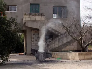A picture taken on February 10, 2018, shows the remains of a missile that landed in the southern Lebanese village of Kaoukaba, near the border with Syria, after Israel's military attacked 12 Syrian and Iranian targets inside Syria on in what it described as "large-scale" raids following an exchange of fire earlier in the day.
(ALI DIA / AFP)