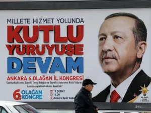 A billboard displays an image of President of Turkey and Leader of the Justice and Development Party (AK Party) Recep Tayyip Erdogan reading "continue the blessed march " in Ankara, on Feb. 14, 2018, four days ahead of the party's 6th ordinary congress in the Turkish capital. 
(ADEM ALTAN / AFP)