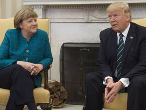 US President Donald Trump and German Chancellor Angela Merkel (AFP/File Photo)	
