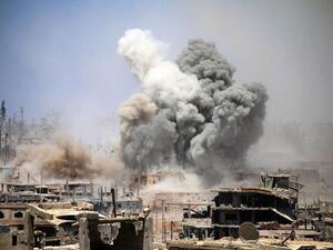 Smoke rises from buildings following a reported air strike on a rebel-held area in the southern Syrian city of Daraa. (AFP/File)