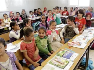 Over the last two decades, Jordan’s primary gross enrollment ratio increased from 71 percent in 1994 to 99 percent in 2010 (AFP/File)