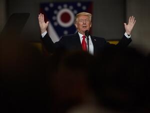 U.S. President Donald Trump speaks to a crowd gathered at the Local 18 Richfield Facility of the Operating Engineers Apprentice and Training, a union and apprentice training center specializing in the repair and operation of heavy equipment on Mar. 29, 2018 in Richfield, Ohio. President Trump's remarks centered upon infrastructure investment in the economy and labor statistics. 
(JEFF SWENSEN / GETTY IMAGES NORTH AMERICA / AFP)
