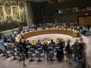 (FILES): In this long exposure photograph, the United Nations Security Council meets concerning the situation in the Middle East, at UN headquarters, April 26, 2018 in New York City. Israel claimed that Iran is using Syria to build a new military front against Israel. Among other topics discussed in the Security Council meeting included discussion about the mass protests along the border fence between the Gaza Strip and Israel. 
(Drew Angerer / GETTY IMAGES NORTH AMERICA / AFP)