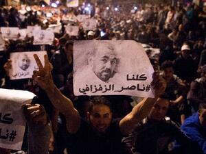 The Al-Hirak al-Shaabi protests took hold of Morocco's northern Rif region and the movement's leader Nasser Zafzafi (posters) and three others received sentences of 20 years for threatening the security of the state (AFP /FADEL SENNA)
