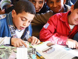 Children read books at school (AFP/File Photo)	