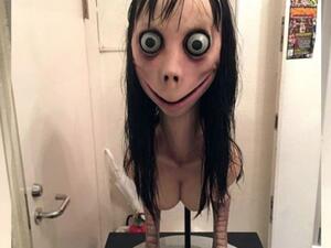 An image of the Momo Challenge, a woman with large eyes, chicken feet. (Instagram)