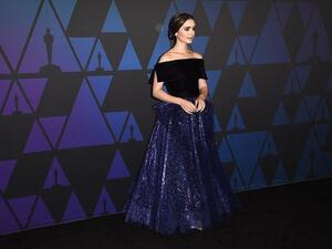 Lily Collins wore a gown by Georges Chakra. (Source: AFP)