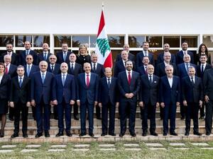 The new Lebanese Cabinet pose for a group photo with President Michel Aoun, first row center. (AFP/ File)