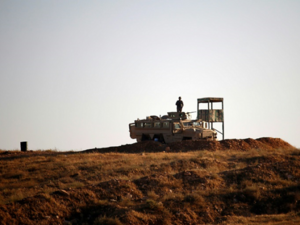 Jordanian soldiers control the border between Syria and Jordan, near the town of Nasib. (AFP/File)
