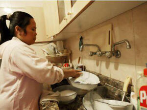 A maid washing the dishes (AFP/File Photo)