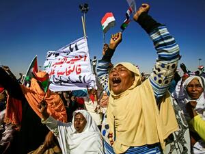 Supporters of Sudanese President Omar al-Bashir shout slogans during a rally in Khartoum. (AFP/ File)