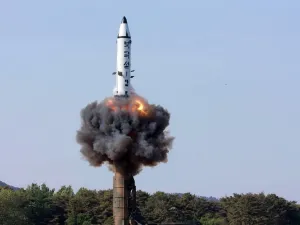 A North Korean ground-to-ground medium-to-long range strategic ballistic missile launches in a test-fire. North Korea on May 22 declared its medium-range Pukguksong-2 missile ready for deployment. (AFP/ File Photo)