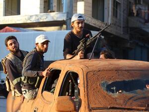 Islamist fighters from Nusra Front travel through the northwestern town of Ariha, May 29, 2015. (AFP/File)