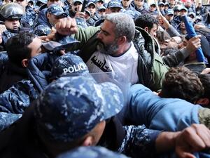 Internal Security Forces officer slapping an Electricité du Liban worker went viral over the weekend, sparking outrage and prompting the ISF to promise to open an investigation/AFP