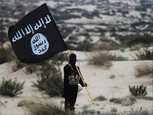 A British 9-year-old declared support for ISIS in class after watching beheading videos online (file photo/AFP)