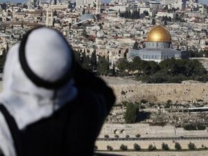 A Palestinian man looks out at the Dome of the Rock in the Old City of Jerusalem. (AFP)