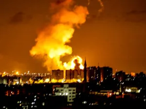An explosion is seen in Gaza City after an air strike by Israeli forces on June 18, 2018. Israeli aircraft pounded over a dozen militant targets in Gaza. (AFP)