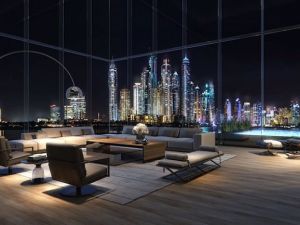 The triplex penthouse apartment spreads across 29,800 sq ft and features several living areas, five en-suite bathrooms, and almost 11,500 sq ft of exterior space. (Courtesy of Omniyat)