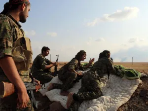 US troops supporting the Syrian Democratic Forces have been deterring Turkish-backed rebels from attacking Kurdish forces in the north of Syria. (Photo: AFP/File photo of SDF forces)
