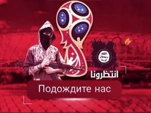 An ISIS fighter carries a rifle next to a bomb bearing ISIS' logo, with the 2018 FIFA World Cup symbol in the back.