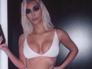 Sizzling: Kim Kardashian continued to revel in the figure benefits of surrogacy as she showed off her incredible physique in a sexy Instagram snap on Thursday (Source: Kim Kardashian - Instagram)