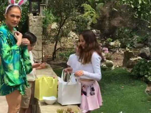 In the beginning: the 43-year-old star started the day clothed in a frond-patterned green and blue kimono (Source: Jennifer Lopez - Instagram)