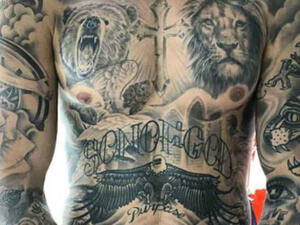 Ink master! Justin Bieber posted a close-up shot of his heavily inked torso on Instagram Wednesday, where he also boasted about the 100+ hours he'd invested in his body art (Source: Justin Bieber - Instagram)