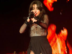 Pins on parade: Camila Cabello displayed her spectacular legs in a double split trousers as she stormed Philadelphia stage at The Fillmore (Source: REX - Shutterstock)