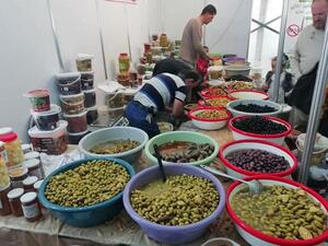 Local producers showcase their olive products during the 19th National Olive Festival, which concluded Saturday evening, at Al Hussein Park in Amman. (Photo courtesy of National Olive Festival Facebook page)