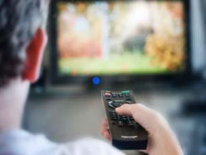 A man watching TV (AFP/File Photo)	