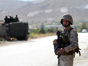 A Lebanese army soldier mans a checkpoint at the entrance to Arsal, North Lebanon (AFP/File Photo)	