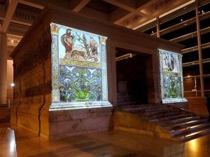 In August 2014 colour was projected onto a set of friezes at the Ara Pacis museum, in Rome (pictured). The removal of colour from ancient artwork has become romanticised and accepted over time  (AFP)