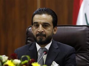 Newly elected parliament speaker Mohammed al-Halbousi heads a meeting at the local government headquarters in Basra on September 18, 2018. (AFP/File)