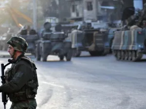 Bashrawi turned himself in after entering into Lebanon from Syria (AFP/File)
