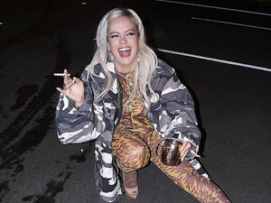 Smoking hot stuff: Lily Allen exhibited her fantastic figure in a tight bodysuit after performing in Colorado on Tuesday... as she claimed she put on FOUR stone during No Shame tour (Source: Lilly Allen - Instagram)