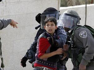 Arabic-speaking Palestinian children arrested by Israeli security are forced to sign confessions written in Hebrew, HRW said. (AFP/File)