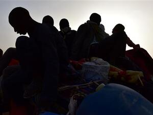A picture taken on March 31, 2017 shows West African refugees on a pickup truck returning from Libya due to violence, in Agadez, northern Niger, following their failed attempt to reach Europe (AFP)