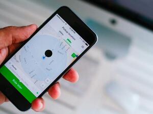 Careem's cellphone application through which customers book and manage rides (AFP/File Photo)	 