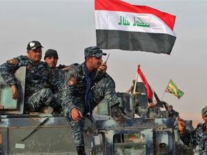 Iraqi forces hold a position near the village of Arbid on the southern outskirts of Mosul. (AFP/File)