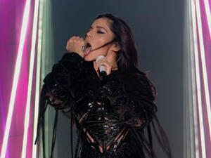 Racy: During one particularly seductive move, the singer licked her hand (Source: ITV)