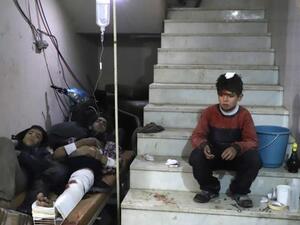 Wounded Syrians wait to receive treatment in the besieged Eastern Ghouta (AFP/File Photo)

