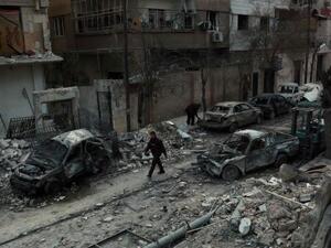 One of the shattered streets in Eastern Ghouta (AFP/File Photo)
