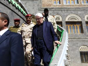 UN envoy to Yemen Martin Griffiths (C) leaves following his meeting with the President of the Huthi Revolutionary Committee, in the capital Sanaa (AFP)