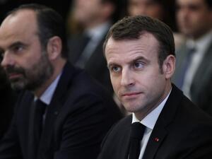 French President Emmanuel Macron (R) and French Prime Minister Edouard Philippe (L)  (AFP)