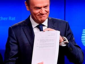 EU council chief Donald Tusk said leaders will gather to approve the long-awaited text on November 25 - but raised eyebrows by adding the caveat 'if nothing extraordinary happens' (AFP)