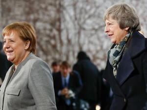 Prime Minister Theresa May  arriving to meet Chancellor Angela Merkel (Twitter)