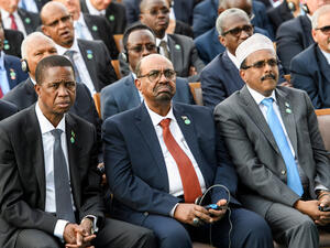 Sudan's President Omar Hassan Ahmad al-Bashir(C) (Shutterstock)