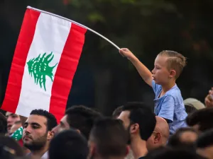 A boy with the flag of Lebanon (Shutterstock)	